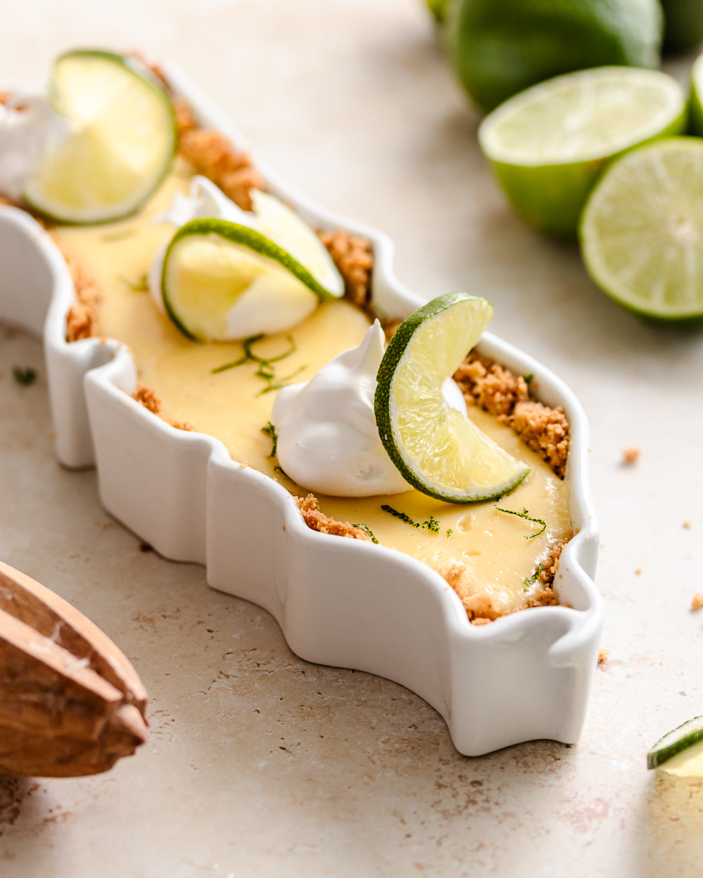 Home sweet home, enjoy the taste of home when you can't be. Showing the Florida State Plate with a key lime pie. You can bake favorite dessert dishes in the State Plate. Ceramic baking dish for desserts. State-shaped dessert.