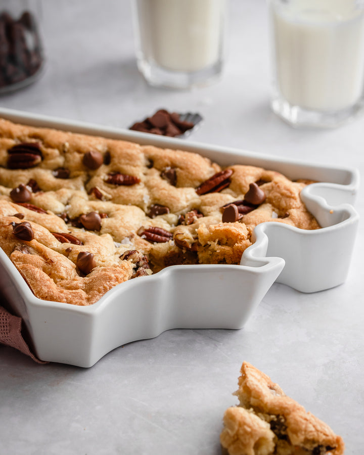 North Carolina pecan bar baked. North Carolina baking dish. North Carolina dessert dish. North Carolina pie plate. NC dessert dish. NC dessert recipe. NC pie dish. NC kitchen gift. NC baking gift. Close up of silhouette of tray.
