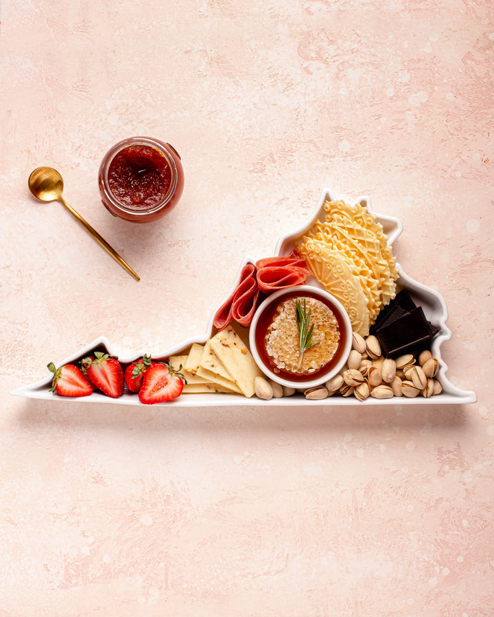 charcuterie board with cheese and cured meats in a Virginia shaped serving tray platter dish
